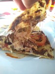 A cheese quesadilla with chicken. A cheese quesadilla with chicken.