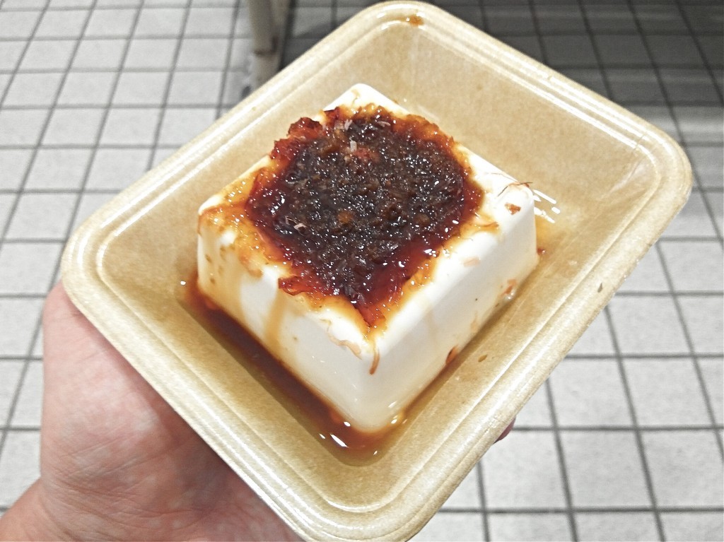 Hard tofu with soy sauce and bonito flakes from 7-eleven store. Hard tofu with soy sauce and bonito flakes from 7-eleven store.