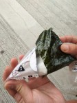 How to make an onigiri - wrapping directions. How to make an onigiri - wrapping directions.