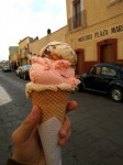 Three scoops of homemade ice creams - walnut, strawberry and nougat. Three scoops of homemade ice creams - walnut, strawberry and nougat.