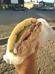 Mexican Torta with ham, cheese, cabbage and avocado.