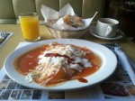 Huevos revueltos a la Zacatecas (scrambled eggs with meat, served with salsa roja and cheese)- Acrópolis rastaurant. Huevos revueltos a la Zacatecas (scrambled eggs with meat, served with salsa roja and cheese)- Acrópolis rastaurant.