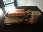 McDonald's Desayuno DeLux – huevo, esponjositos hotcakes, papa hashbrown, muffin, salchicha y tocino - scrambled eggs, pancakes, potato hashbrown, muffin, bacon and saussage.