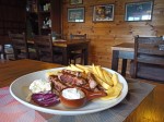 Montenegrin Ćevapi with cream and fries Montenegrin Ćevapi with cream and fries