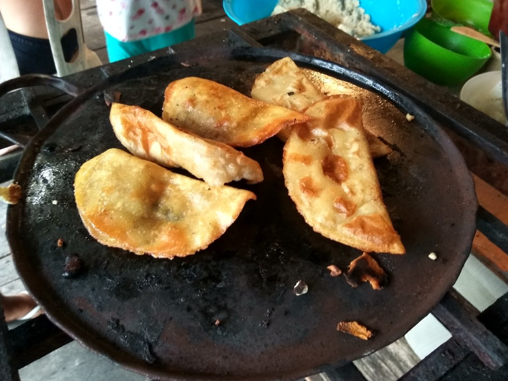Mexican empanadas con queso - Mexican fried dumplings with fresh cheese. Mexican empanadas con queso - Mexican fried dumplings with fresh cheese.