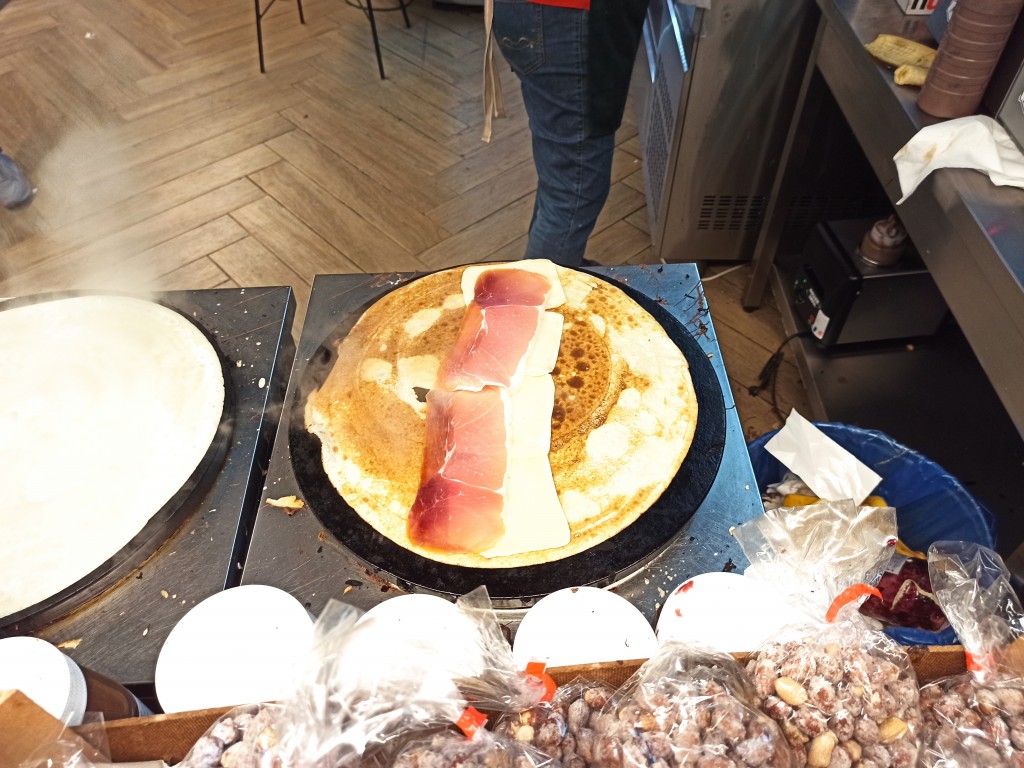 Take Parma ham slice and put them on the cheese.  Take Parma ham slice and put them on the cheese.