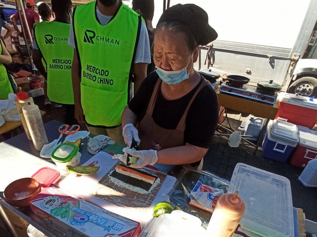 16. Place avocado and cucumber slices or stripes on the rice, cover the whole length of the nori sheet with rice 16. Place avocado and cucumber slices or stripes on the rice, cover the whole length of the nori sheet with rice