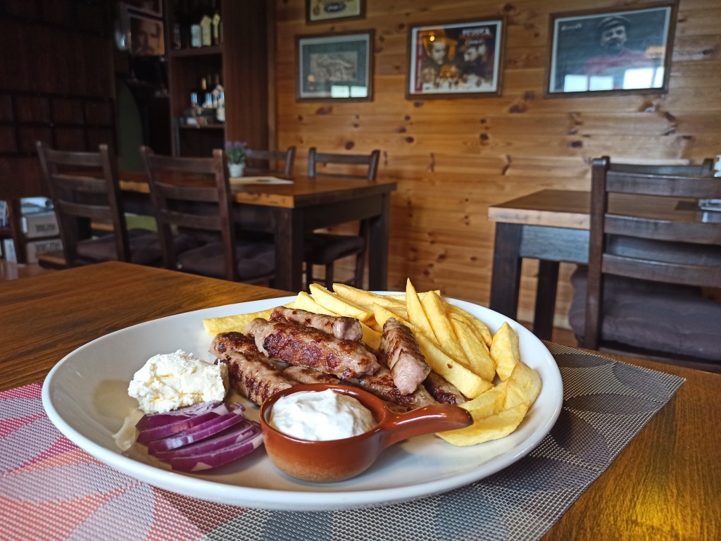 Montenegrin Ćevapi with cream and fries Montenegrin Ćevapi with cream and fries
