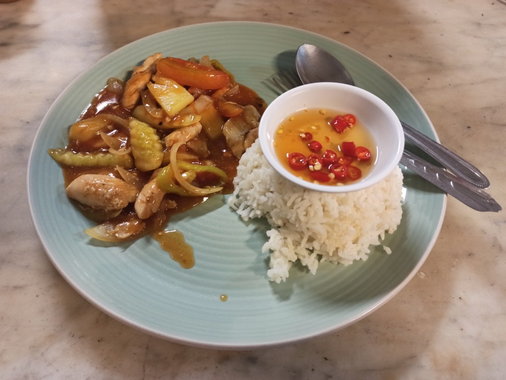 A Thai style sweet and sour chicken with rice A Thai style sweet and sour chicken with rice