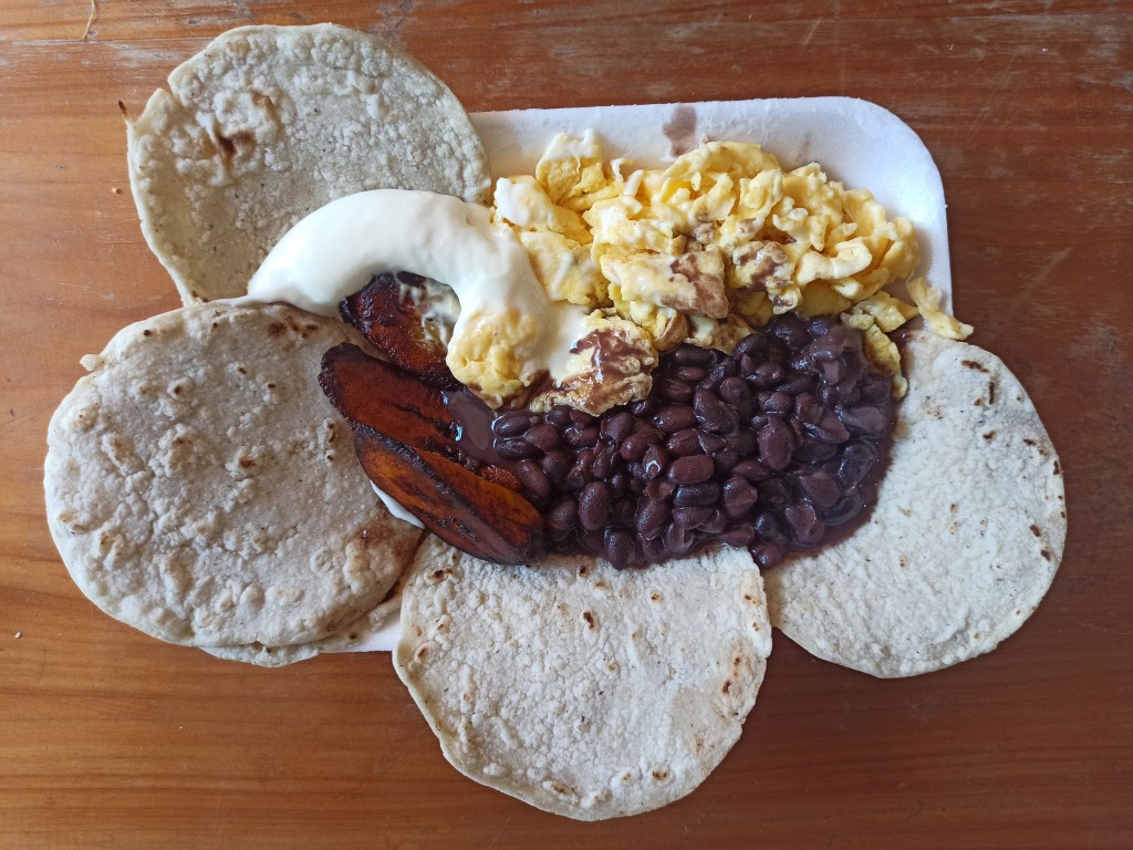 Desayuno Chapin with eggs, red beans, platans, cream or fresh cheese and tortillas Desayuno Chapin with eggs, red beans, platans, cream or fresh cheese and tortillas