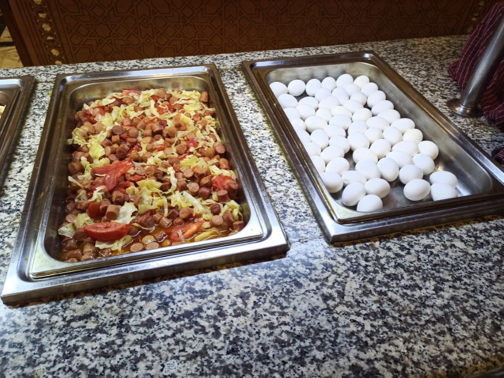 Fried sausage with tomatoes and cabbage Fried sausage with tomatoes and cabbage